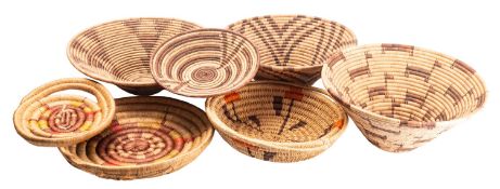 Seven various woven palm, straw-work and cord baskets, Botswana,