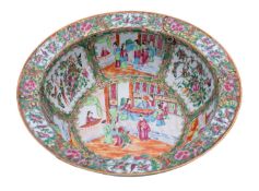 A Canton porcelain basin profusely enamelled in the traditional palette with scholars and