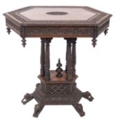 An 'Anglo Indian', probably Burnese carved and stained hardwood centre table,