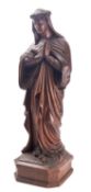 A Continental, probably French carved oak model of the Virgin Mary, 19th century; depicted standing,