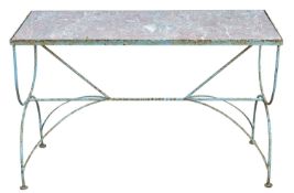 A wrought iron and marble topped garden or conservatory table,