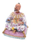 A German porcelain nodding-head pagoda figure in Marcolini Meissen style,