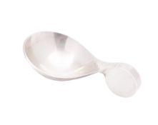 A 20th century silver caddy spoon, designed by A.G. Styles, for Garrard & Co.