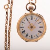 A lady's 14k gold open faced pocket watch the case stamped 14K with a gilt-brass inner cuvee,