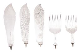 Two pairs of silver fish servers,