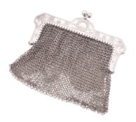 A late 19th/ early 20th century continental silver mesh purse, with a raised corded border,