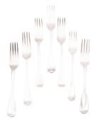 Seven silver table forks, two in Fiddle pattern, crested, and five Old English pattern examples,