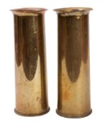 Two WWI era shell case vases. Having flu