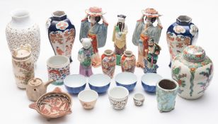 A mixed group of predominantly Chinese a