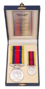 A Malaysian Pingat Jasa Medal, miniature