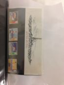 An album of stamps, postcards, beer mats