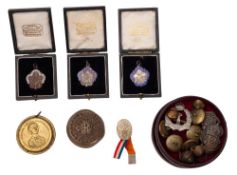 Three Royal Academy of Music medallions.