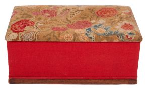 A tapestry embroidered and fabric covere