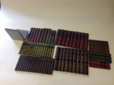 Six faux book-spine panels. With metal stands.