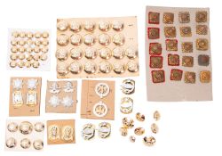 A collection of various regimental butto