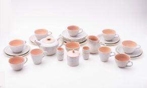 A Poole Pottery Twin Tone service, in peach bloom and seagull, printed marks.