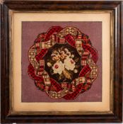 A pair of woven fabric floral pictures,