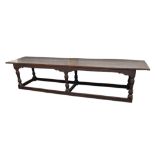 A substantial oak refectory table,