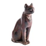 AN EGYPTIAN BRONZE MODEL OF A CAT, LATE PERIOD, 26TH-30TH DYNASTY, CIRCA 664-332 B.C.,