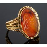 A 19th century yellow metal and agate intaglio seal ring,