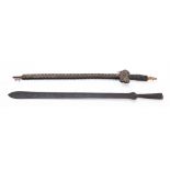 A 19th century North African Takouba, Tuareg tribal sword in tooled leather scabbard, 95cm long,