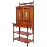 A Victorian parcel-gilt satinwood side cabinet on stand in Aesthetic movement style,