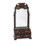 A George I black lacquer and chinoiserie swing frame toilet mirror and writing desk,