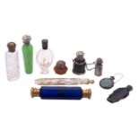 Seven silver mounted scent bottles, to include a leather mounted scent bottle,
