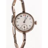 Rolex, a lady's silver wristwatch the round white dial having black and red Arabic numerals,