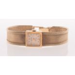 A Rolex Precision 9ct gold lady's wristwatch, the square dial with baton and Arabic numerals,