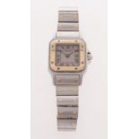 Cartier Santos a stainless-steel and gold wristwatch, the square dial with Roman numerals,