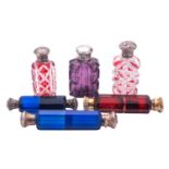 Six silver mounted cut-glass scent bottles, to include two red & clear scent bottles,