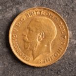 A George V half sovereign, bare head, reverse with St. George and The Dragon and dated 1911