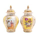A pair of Continental gilt-metal mounted vases and covers and a pair of Dresden vases and covers,