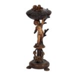 A Continental carved, stained and partially painted workbox on stand,