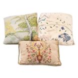 A group of nine various embroidered and fabric cushions;