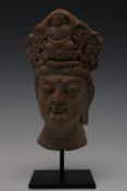 A Terracotta Head of a Crowned Bodhisattva, Possibly Ancient Gandhara