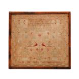 A 19TH CENTURY NEEDLEWORK SAMPLER.