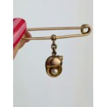 antique 9ct yellow gold safety pin brooch with hanging shell , pearl charm