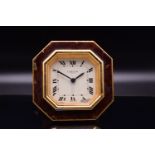A Fine Cartier Gold Gilt and Burgundy Enamel Octagonal Travel Alarm Clock, Circa 1980