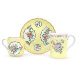 A Worcester yellow-ground coffee cup and saucer and a small mug, the porcelain circa 1770-80