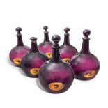 A good part set of six second half 19th century amethyst glass apothecary bottles and stoppers (6)