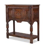 An oak livery cupboard Probably constructed from first half 17th century elements such as the Ja...