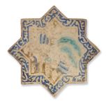 A Kashan lustre moulded pottery star tile Persia, late 13th/ early 14th Century
