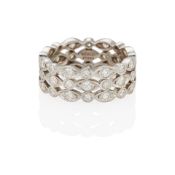 TIFFANY & CO.; PLATINUM AND DIAMOND WIDE ETERNITY BAND