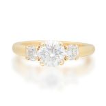 MOUNTED BY CARTIER: DIAMOND THREE-STONE RING, 1994