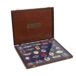 A cased display set of 'Badges of the World's Great Motor Cars', by Danbury Mint,