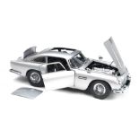 A 1:8 scale model of the James Bond 'Goldfinger' Aston Martin DB5 by Eaglemoss, ((Qty))