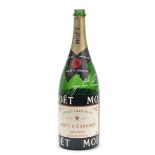 A Moet & Chandon Champagne bottle signed by Ayrton Senna, dated 91',
