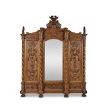 Important mobilier de chambre, en noyer et bois sculpté attribué à Luiggi Frullini...